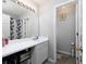Clean bathroom with white vanity, large mirror, and shower/tub combo at 253 Gallant Se # 17, Mableton, GA 30126