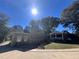 House exterior view, showcasing the side and screened porch at 3593 Cruse Rd, Lawrenceville, GA 30044