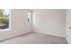 Well-lit bedroom with neutral walls and carpet flooring at 3647 Georgia Ave # 17, Hapeville, GA 30354
