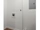 Unfinished laundry area with hookups and storage at 3512 Collier Nw Dr, Atlanta, GA 30331