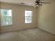 Spacious bedroom with new carpet and large windows at 6348 Wellington Walk Way, Lithonia, GA 30058