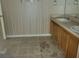 Updated bathroom with double vanity and tile flooring at 6348 Wellington Walk Way, Lithonia, GA 30058