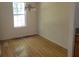 Simple dining room with hardwood floors and a window at 6348 Wellington Walk Way, Lithonia, GA 30058