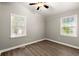 Bright and airy bedroom with hardwood floors and large windows at 2396 Abner Nw Pl, Atlanta, GA 30318