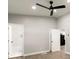 Well-lit bedroom with hardwood floors and access to a bathroom at 2396 Abner Nw Pl, Atlanta, GA 30318