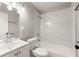 Clean bathroom with a bathtub, shower, and white vanity at 2396 Abner Nw Pl, Atlanta, GA 30318