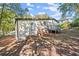 House exterior with deck and wooded backdrop at 2396 Abner Nw Pl, Atlanta, GA 30318