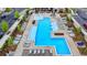 Community pool area with expansive deck and comfortable seating at 4627 Molder Dr, Buford, GA 30518