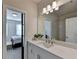 Small bathroom with a single vanity and access to a bedroom at 4627 Molder Dr, Buford, GA 30518