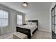 Spacious bedroom with carpeted floors and large windows at 4627 Molder Dr, Buford, GA 30518