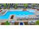 Aerial view of a resort-style pool with plenty of lounge chairs at 4627 Molder Dr, Buford, GA 30518