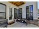 Cozy patio with seating area and grill at 4627 Molder Dr, Buford, GA 30518