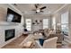 Living room with sectional sofa and fireplace at 4627 Molder Dr, Buford, GA 30518
