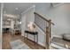 Bright entryway with hardwood floors and staircase at 4627 Molder Dr, Buford, GA 30518