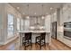Modern kitchen with stainless steel appliances and an island at 4627 Molder Dr, Buford, GA 30518