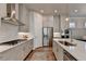Modern kitchen with stainless steel appliances and white cabinets at 4627 Molder Dr, Buford, GA 30518