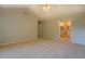 Large bedroom with high ceilings and a ceiling fan at 2404 Lake Cove Ct, Lithonia, GA 30058