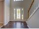 Entryway with hardwood floors and staircase at 2404 Lake Cove Ct, Lithonia, GA 30058