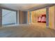 Bright living room with carpet and open floor plan at 2404 Lake Cove Ct, Lithonia, GA 30058