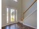 Entryway with hardwood floors and a staircase at 2404 Lake Cove Ct, Lithonia, GA 30058