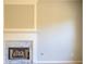 Elegant marble fireplace with a traditional mantel at 2404 Lake Cove Ct, Lithonia, GA 30058