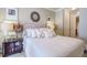 Bright bedroom with a king-size bed and contemporary decor at 2300 Peachford Rd # 1205, Dunwoody, GA 30338