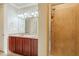 Double vanity bathroom with a large mirror and a separate shower at 2300 Peachford Rd # 1205, Dunwoody, GA 30338