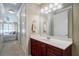 Bathroom with a single vanity and a view of the bedroom at 2300 Peachford Rd # 1205, Dunwoody, GA 30338