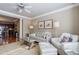 Light-filled living room, featuring hardwood floors and neutral decor at 2300 Peachford Rd # 1205, Dunwoody, GA 30338