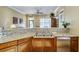Community kitchen with granite countertops and stainless steel appliances at 2300 Peachford Rd # 1205, Dunwoody, GA 30338