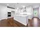 Modern kitchen with white cabinets and island at 118 Briargate Dr, Johns Creek, GA 30097