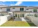Covered patio, fenced backyard, and grassy area at 118 Briargate Dr, Johns Creek, GA 30097
