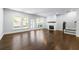 Spacious living room with hardwood floors and fireplace at 118 Briargate Dr, Johns Creek, GA 30097