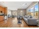 Open living room with hardwood floors and large windows at 238 Walker Sw St # 35, Atlanta, GA 30313