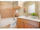 Clean bathroom with a tub, shower, and wooden vanity at 238 Walker Sw St # 35, Atlanta, GA 30313