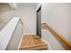 Clean and modern stairwell with light wood flooring at 238 Walker Sw St # 35, Atlanta, GA 30313