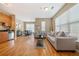 Spacious living room with hardwood floors and gray sofas at 238 Walker Sw St # 35, Atlanta, GA 30313
