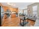 Open concept living area with hardwood floors and gray sofa at 238 Walker Sw St # 35, Atlanta, GA 30313