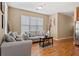 Living room with hardwood floors and gray sofas at 238 Walker Sw St # 35, Atlanta, GA 30313