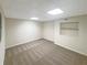 Finished basement offering extra living space with neutral carpet at 200 Eagle Glen Ct, Woodstock, GA 30189