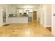 Kitchen with island, tile floor, and white cabinets at 5335 Saville Nw Dr, Acworth, GA 30101
