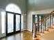 Grand entryway with arched window and double doors at 5335 Saville Nw Dr, Acworth, GA 30101