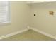 Laundry Room with window and tile floor at 5335 Saville Nw Dr, Acworth, GA 30101