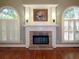 Elegant fireplace with white mantel and brick surround at 5335 Saville Nw Dr, Acworth, GA 30101