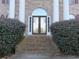 Ornate double doors with brick steps and landscaping at 5335 Saville Nw Dr, Acworth, GA 30101