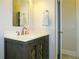 Vanity with mirrored cabinet and quartz countertop at 5335 Saville Nw Dr, Acworth, GA 30101