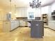 Open concept kitchen with large island and breakfast area at 5335 Saville Nw Dr, Acworth, GA 30101