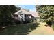 Brick home with columns and landscaped yard at 5335 Saville Nw Dr, Acworth, GA 30101