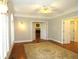 Spacious living room with hardwood floors, large windows and access to other rooms at 5335 Saville Nw Dr, Acworth, GA 30101