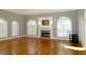 Living room with hardwood floors and fireplace at 5335 Saville Nw Dr, Acworth, GA 30101